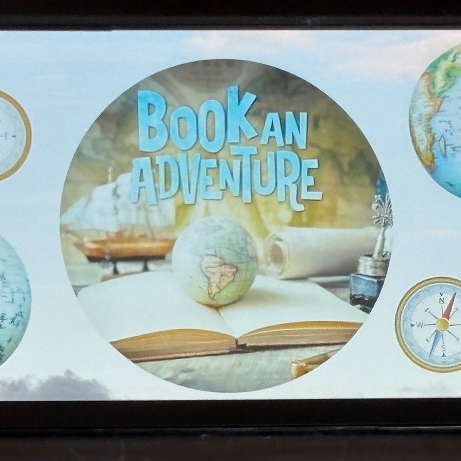 Book an Adventure Circle (Globes) Transparent Window Graphics